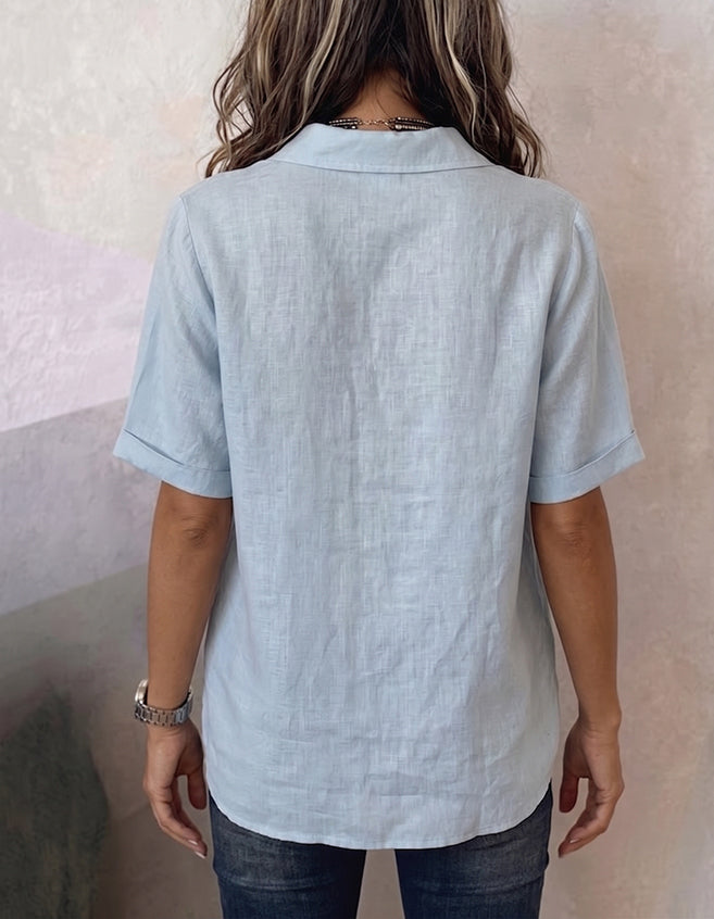 Camicia casual da donna a tinta unita con taglio irregolare
