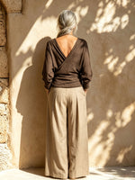 Completo due pezzi donna con top avvolgente in maglia e pantaloni larghi in lino