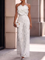 Elegantes romantisches Resort-Outfit mit floralem Zweiteiler