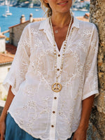 Chemisier en coton et lin pour femmes avec broderie florale, œillets et manches mi-longues