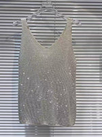 Chaleco de punto con pedrería elegante y brillante