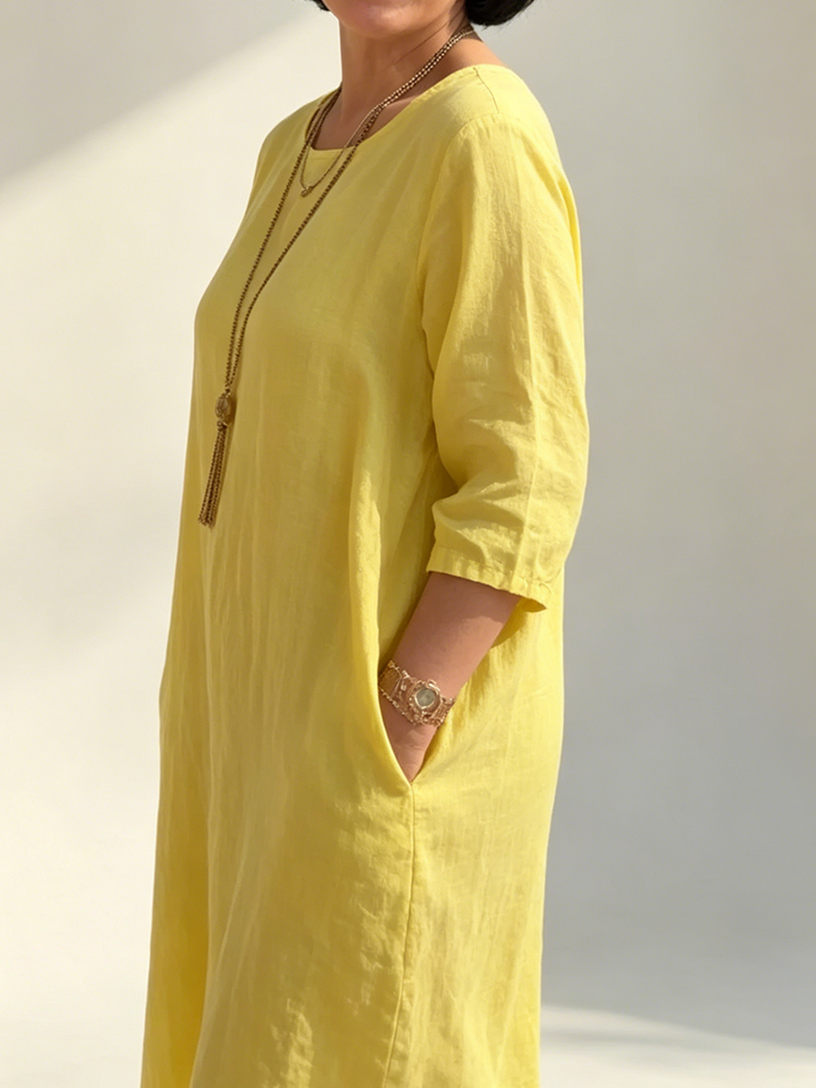 Sonnengelbes Kleid aus Baumwoll-Leinen mit seitlichen Schlitzen