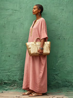 Vestido maxi bohemio de algodón y lino con escote en V color dorado
