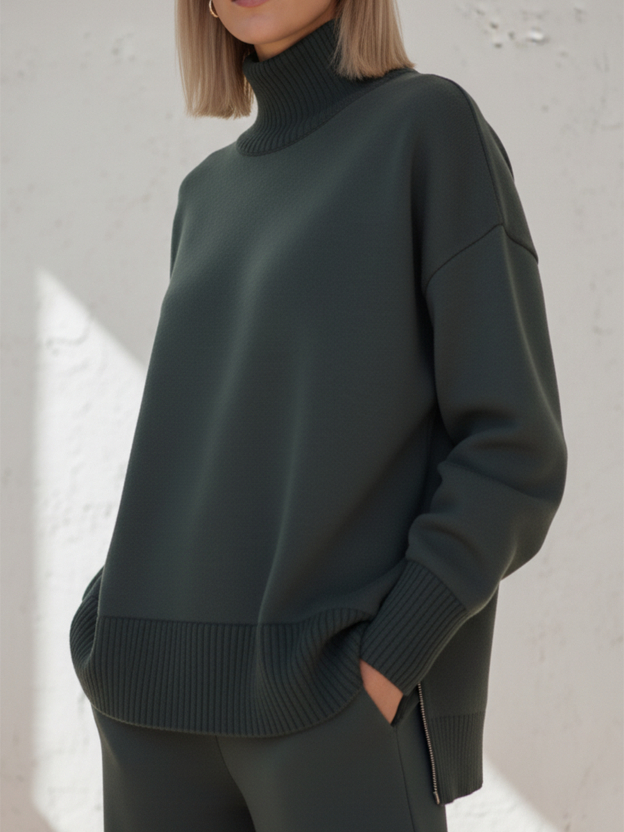 Completo due pezzi casual da viaggio con top a collo alto e cerniera laterale e pantaloni dritti