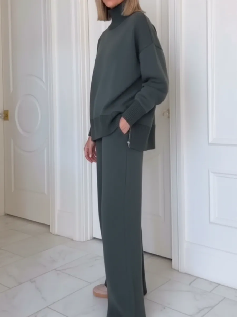 Completo due pezzi casual da viaggio con top a collo alto e cerniera laterale e pantaloni dritti
