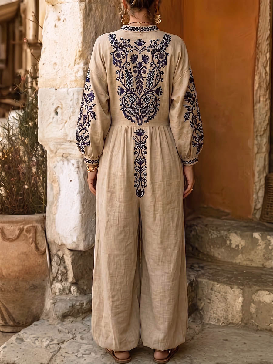 Combinaison décontractée pour femme en coton-lin, à manches longues, col en V avec imprimé placé, coupe ample et jambes larges.