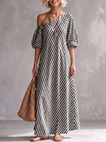 Abito lungo elegante e classico a righe con spalle scoperte