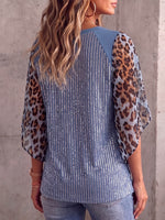 Camicia vintage elegante in pizzo con paillettes scintillanti e inserti patchwork cut-out