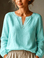 Elegante Bluse mit V-Ausschnitt aus Leinenmischung und Spitzenbesatz