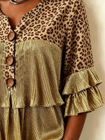 Blusa da donna con stampa leopardata, volant metallici e scollo a V