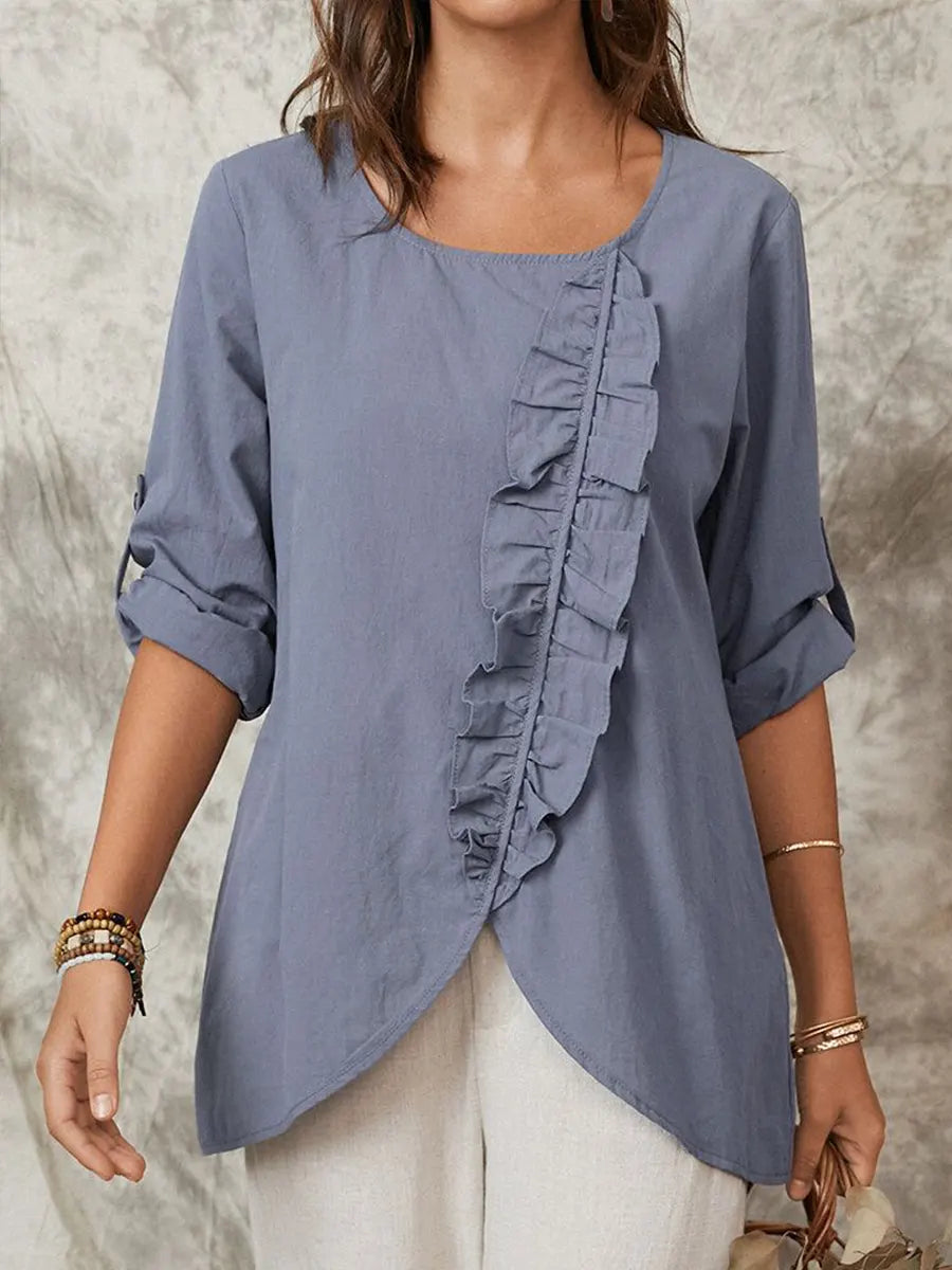 Elegante asymmetrische Tunika mit Rüschen und Oberteil mit hochgekrempelten Ärmeln