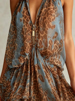 Damenkleid mit Leopardenmuster, Reißverschluss vorne, High-Low-Saum und Neckholder
