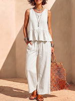 Conjunto para mujer de algodón y lino de color sólido: blusa sin mangas con cuello redondo y ajuste holgado, y pantalones de pierna ancha de talle alto.