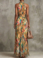 Damen Maxikleid mit Neckholder, buntem Tiermuster, Chiffon und Taschen