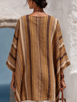 Blusa poncho a righe in stile boho-chic