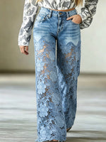 Damejeans med høy midje, blomsterblonde og brede ben i denim