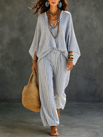Completo donna a due pezzi in cotone e lino con maglia a maniche lunghe a righe e pantaloni casual artisticamente stilizzati