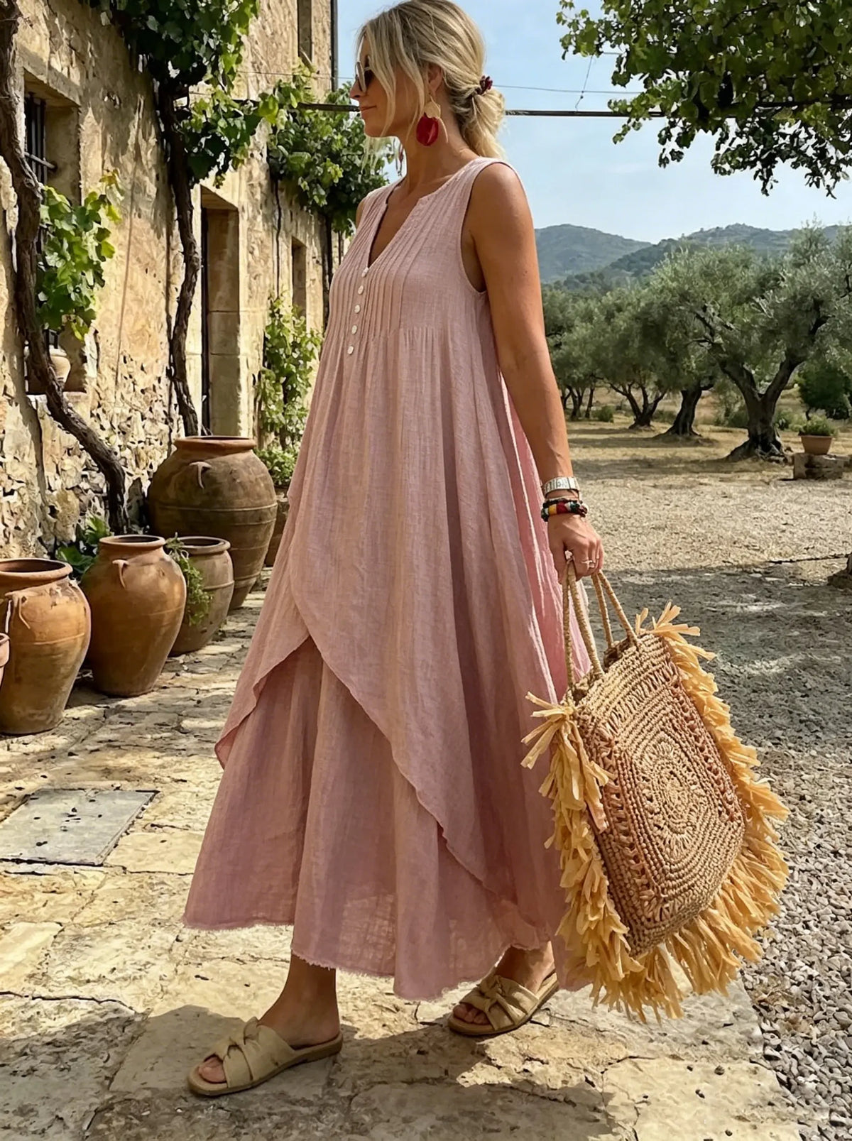 Abito lungo asimmetrico in lino color rosa polvere