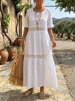 Vestido blanco vintage con volantes y flores caladas