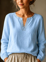 Elegante Bluse mit V-Ausschnitt aus Leinenmischung und Spitzenbesatz