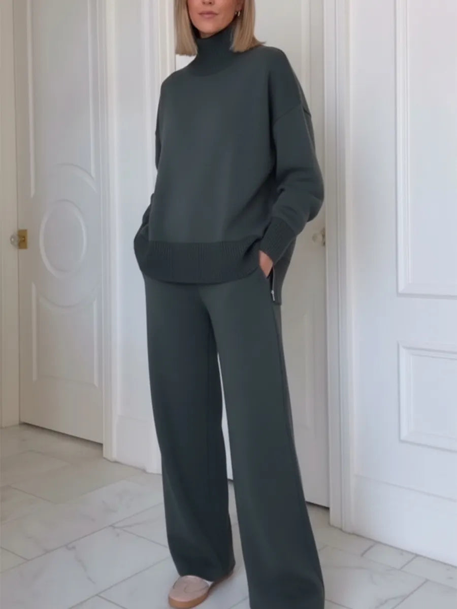 Completo due pezzi casual da viaggio con top a collo alto e cerniera laterale e pantaloni dritti