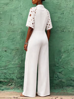 Eleganter schicker Jumpsuit mit floraler Spitzen-Einsatz-Strickoptik