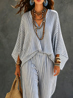 Completo donna a due pezzi in cotone e lino con maglia a maniche lunghe a righe e pantaloni casual artisticamente stilizzati