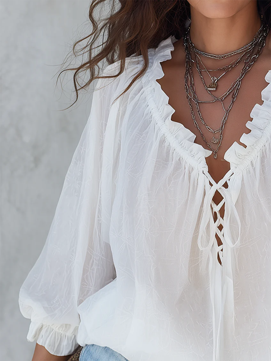 Blouse rétro à volants avec col en V et nouée devant