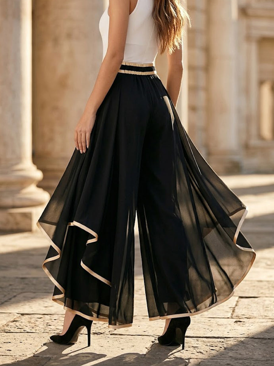 Pantalones fluidos de gasa con ribete dorado elegante