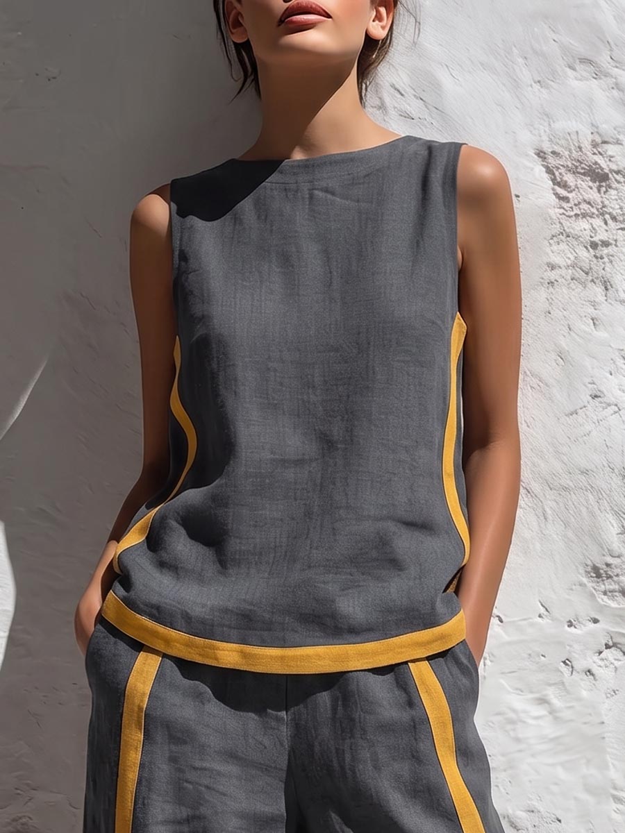 Completo donna in cotone e lino composto da top casual senza maniche con scollo rotondo e pantaloni larghi a vita alta, comodi e ampi.