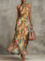 Damen Maxikleid mit Neckholder, buntem Tiermuster, Chiffon und Taschen