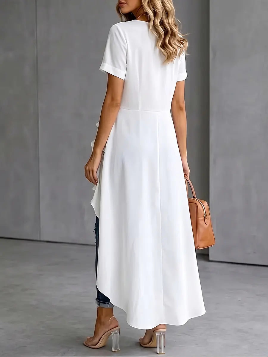 Elegante blouse met strik aan de voorkant en ruches, met een hoge-lage zoom