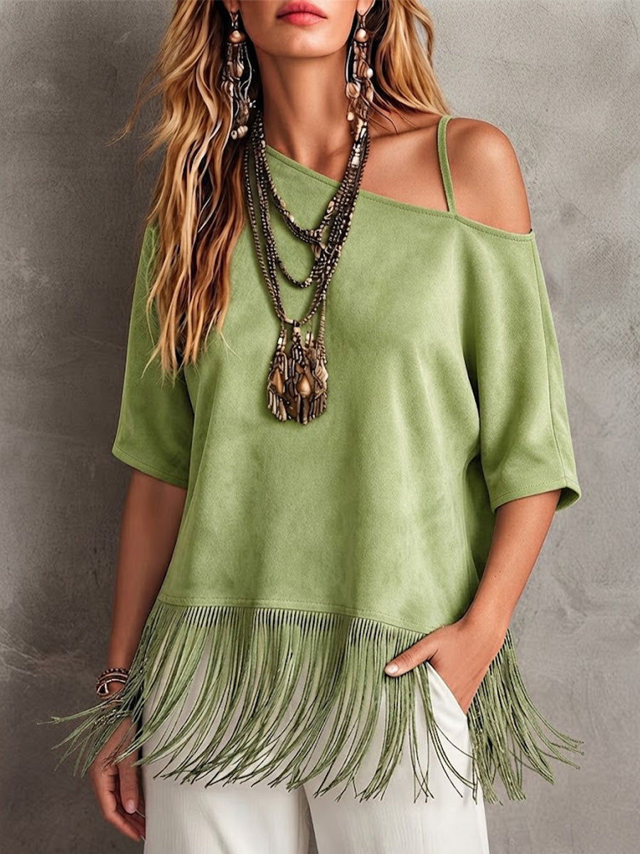Blusa de ante sintético de manga corta y corte holgado con escote asimétrico al hombro y dobladillo con flecos