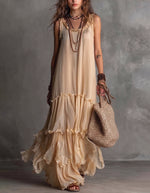 Robe longue style resort sans manches à fines bretelles spaghetti pour femme, en chiffon fluide avec volants, idéale pour la plage.