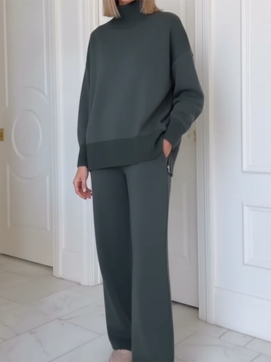 Completo due pezzi casual da viaggio con top a collo alto e cerniera laterale e pantaloni dritti