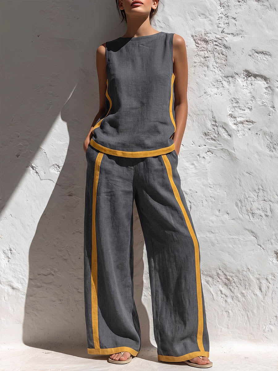 Completo donna in cotone e lino composto da top casual senza maniche con scollo rotondo e pantaloni larghi a vita alta, comodi e ampi.