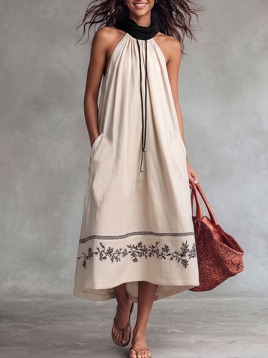Vestito casual da donna in lino, senza maniche, ampio, con stampa posizionata e colletto morbido.